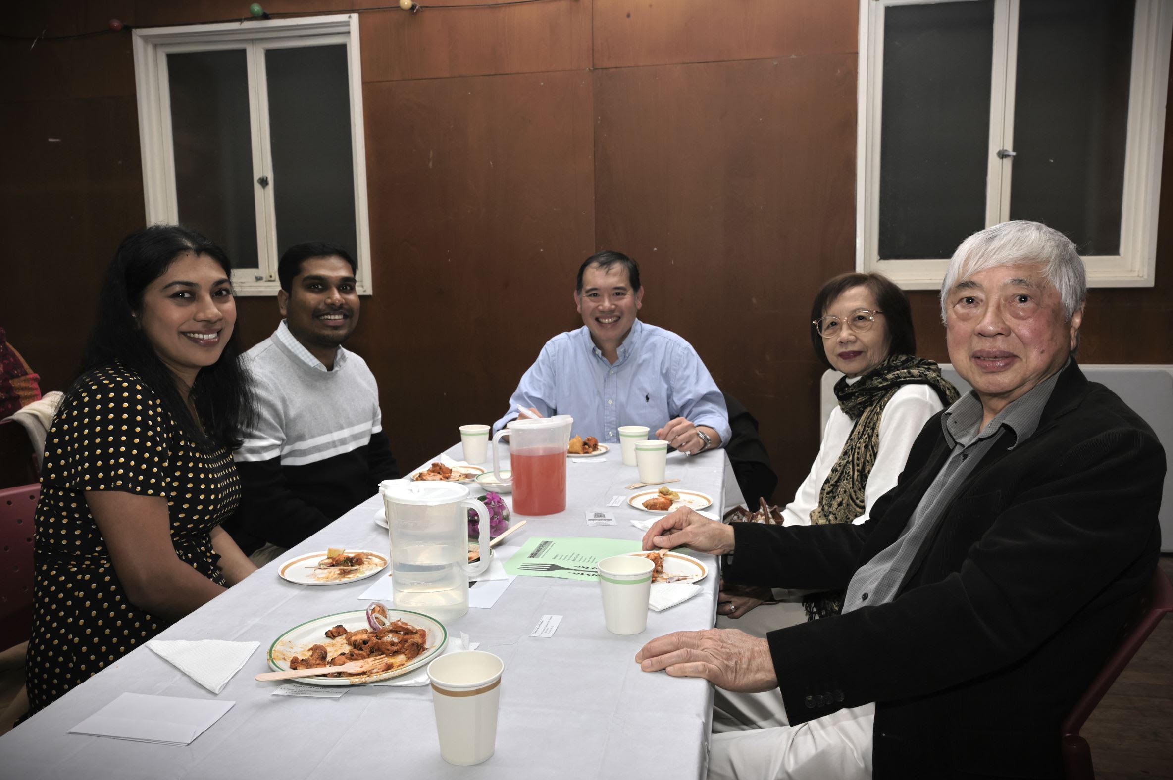 Supporters seated together at the dinner