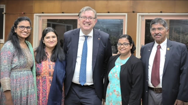 Group photograph of supporters with the guest speaker